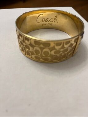 Coach Gold Logo-Embossed Wide Bangle Bracelet